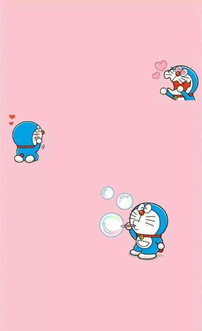 Nền điện thoại Doraemon dễ thương trên nền hồng pastel làm hình nền smartphone.