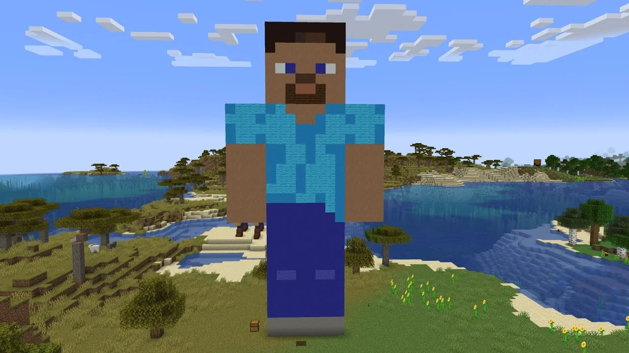 Ảnh avatar mặc định Steve khổng lồ trong Minecraft đứng bên bờ biển giữa phong cảnh đồng cỏ và đảo xanh