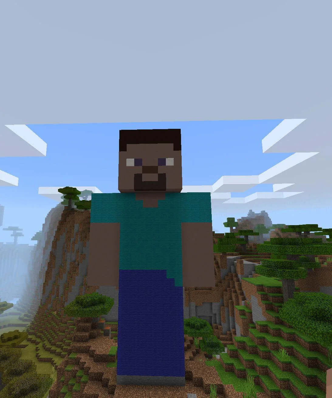 Ảnh avatar mặc định Minecraft với nhân vật Steve khổng lồ đứng giữa cảnh núi, cây xanh và bầu trời xanh.