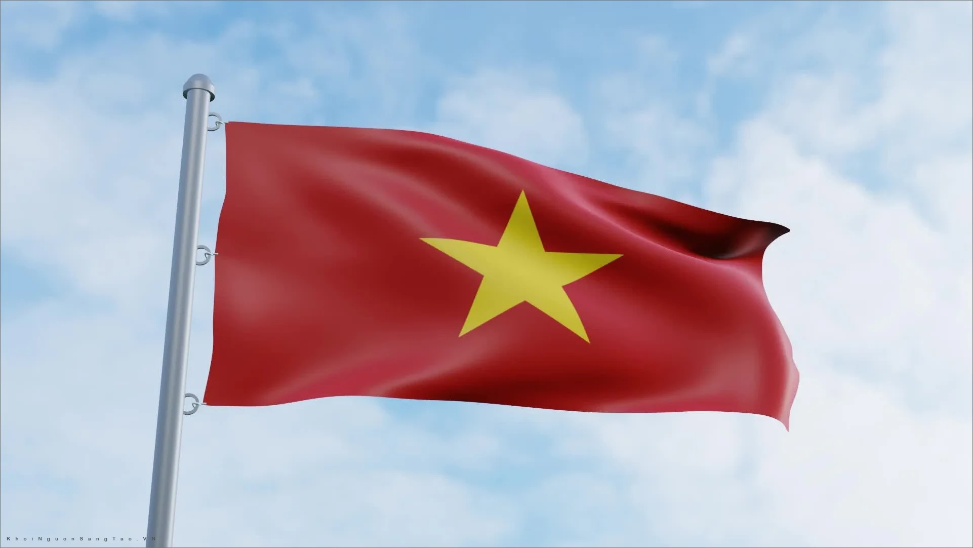 Hình ảnh lá cờ Việt Nam tung bay trên bầu trời xanh đẹp và sắc nét
